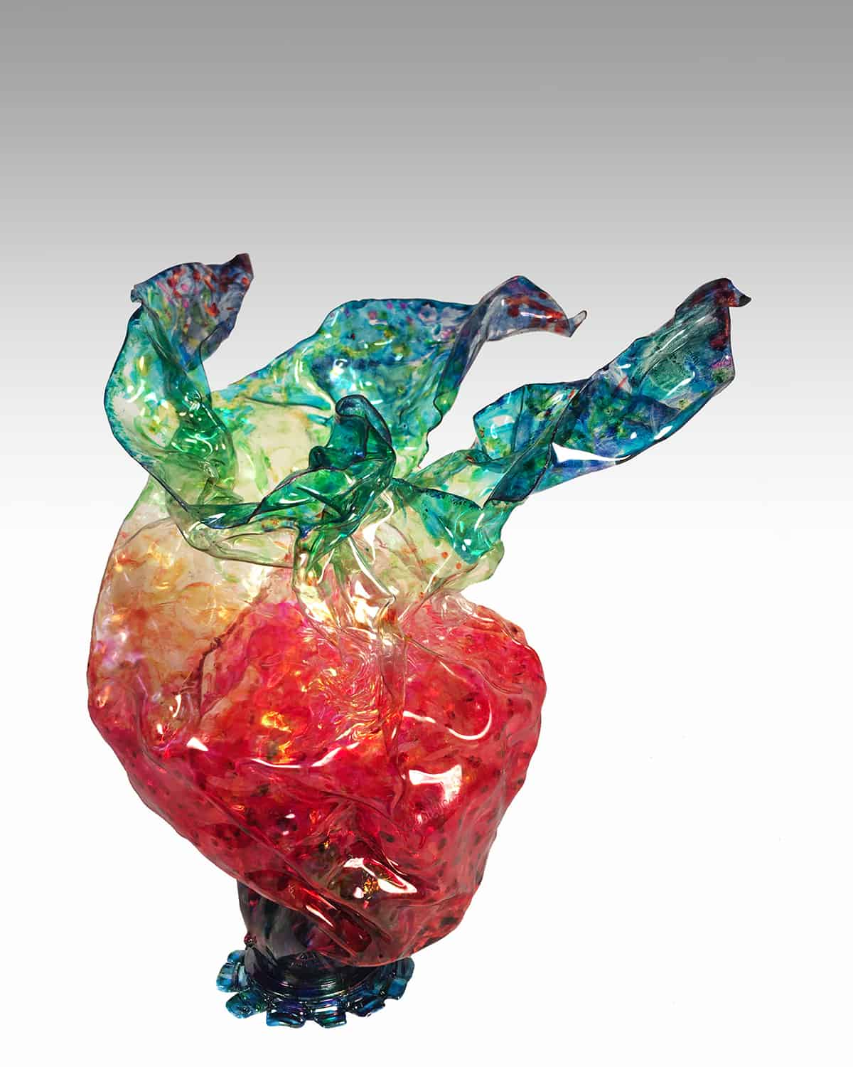 A glass sculpture depicting a heart.